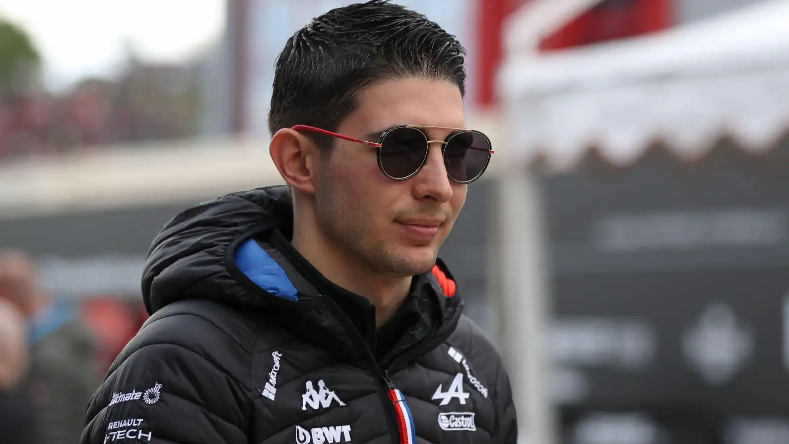 Esteban Ocon, Alpine, wears a jacket and sunglasses. Italy, April 2022.