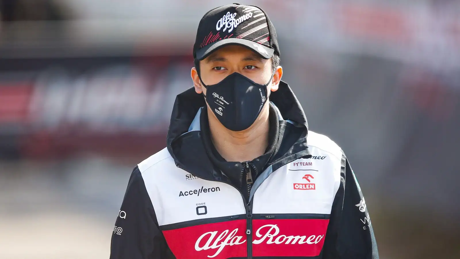 Zhou Guanyu wearing a mask and hat. Imola, April 2022.