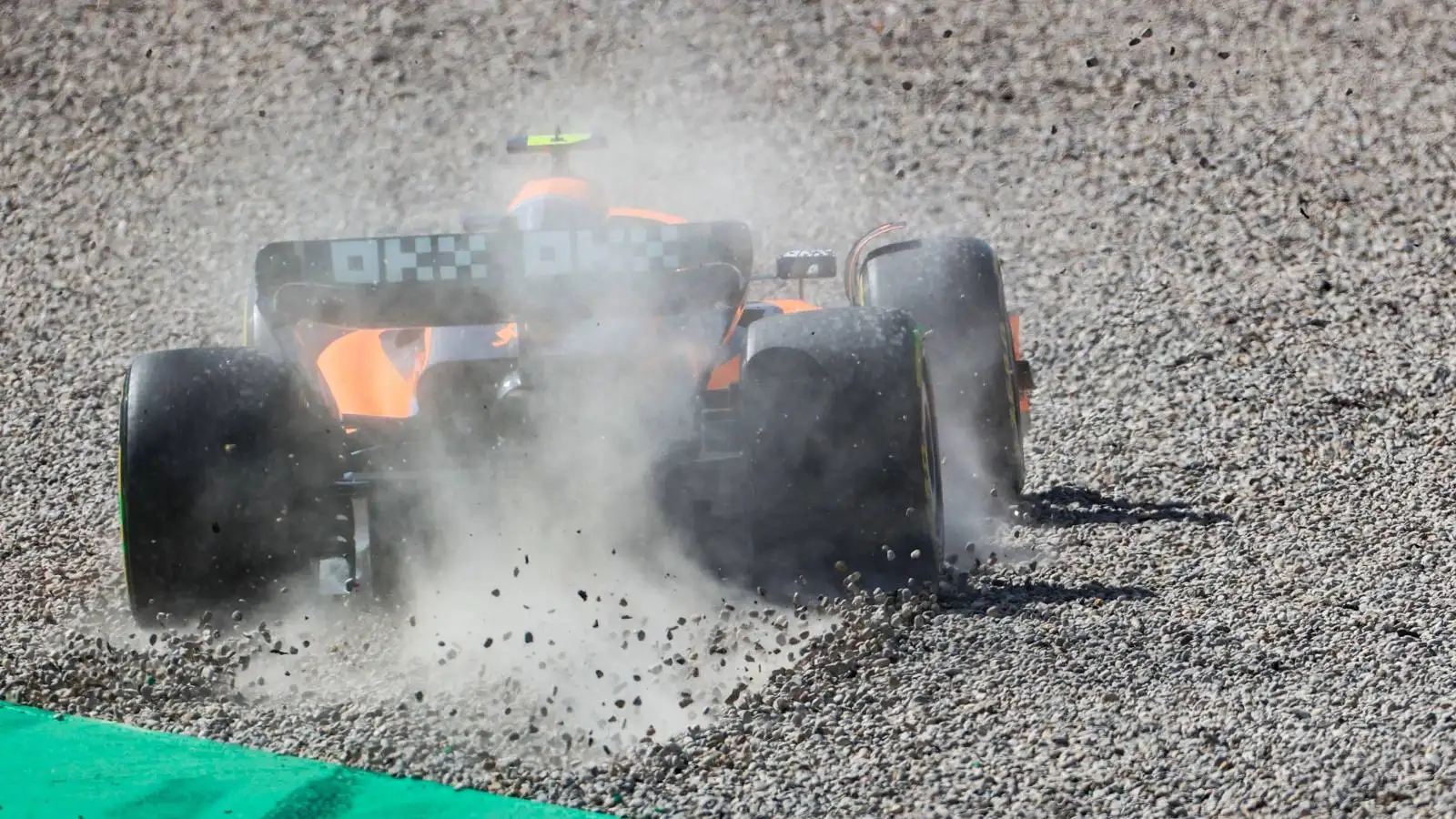 Lando Norris, McLaren, in the gravel. Spain, May 2022.