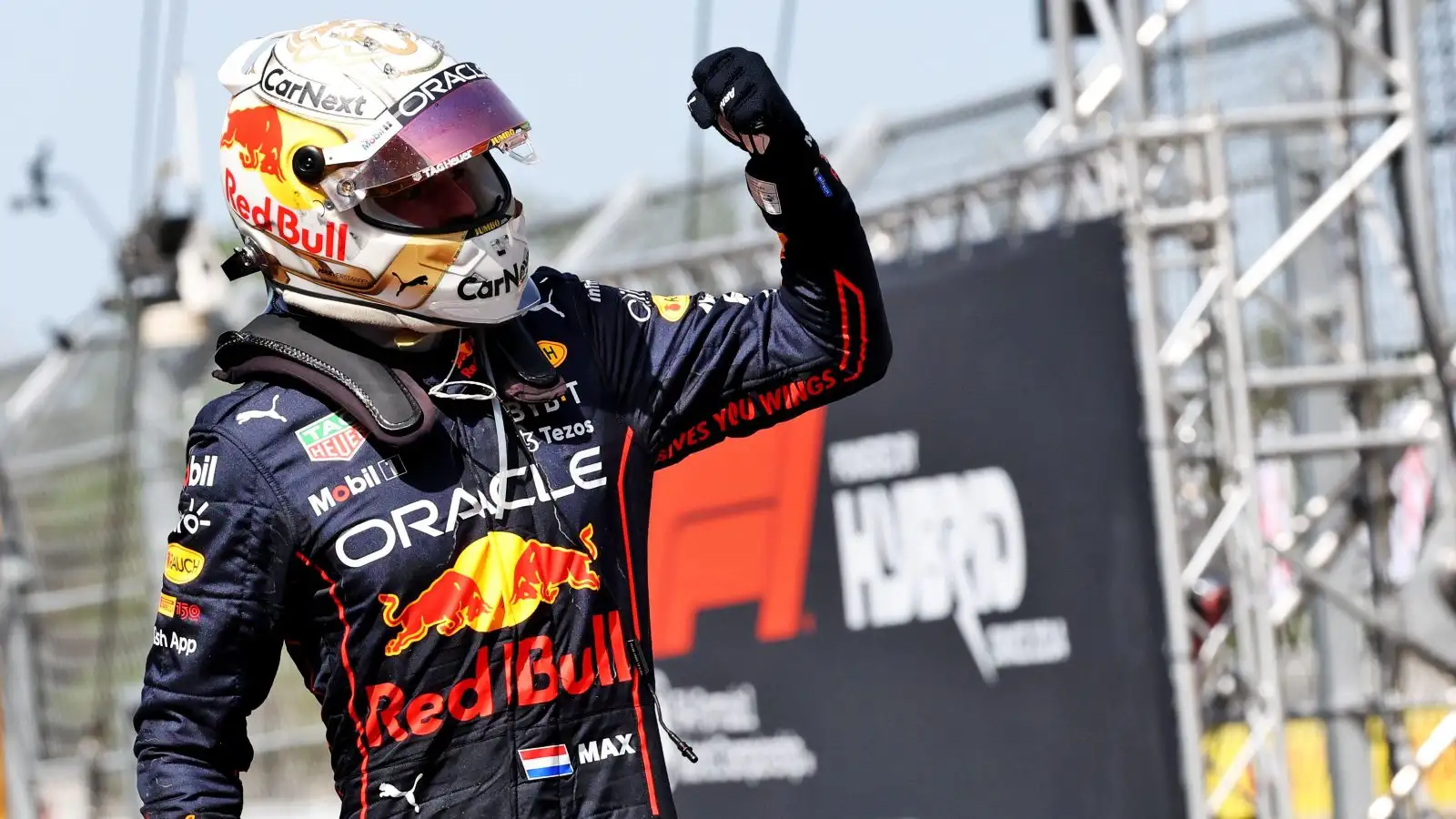 Max Verstappen raises his arm in celebration. Barcelona, May 2022.