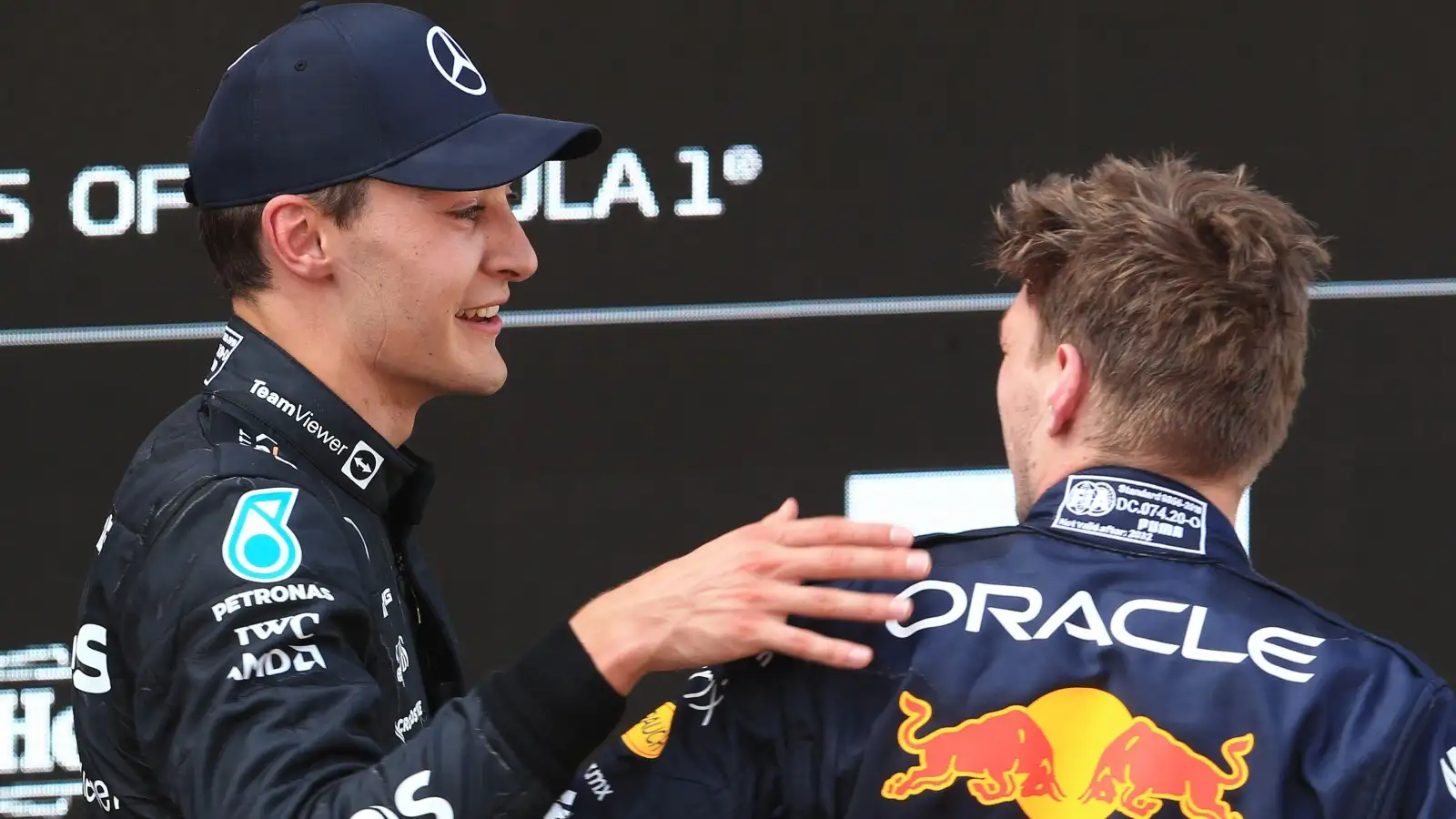 George Russell, Mercedes, and Max Verstappen, Red Bull, talk. Spain. May 2022.