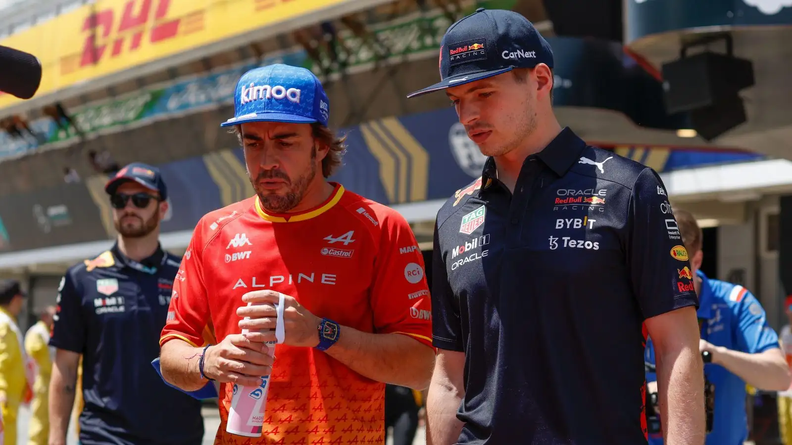 Fernando Alonso speaking to Max Verstappen. Barcelona, May 2022.