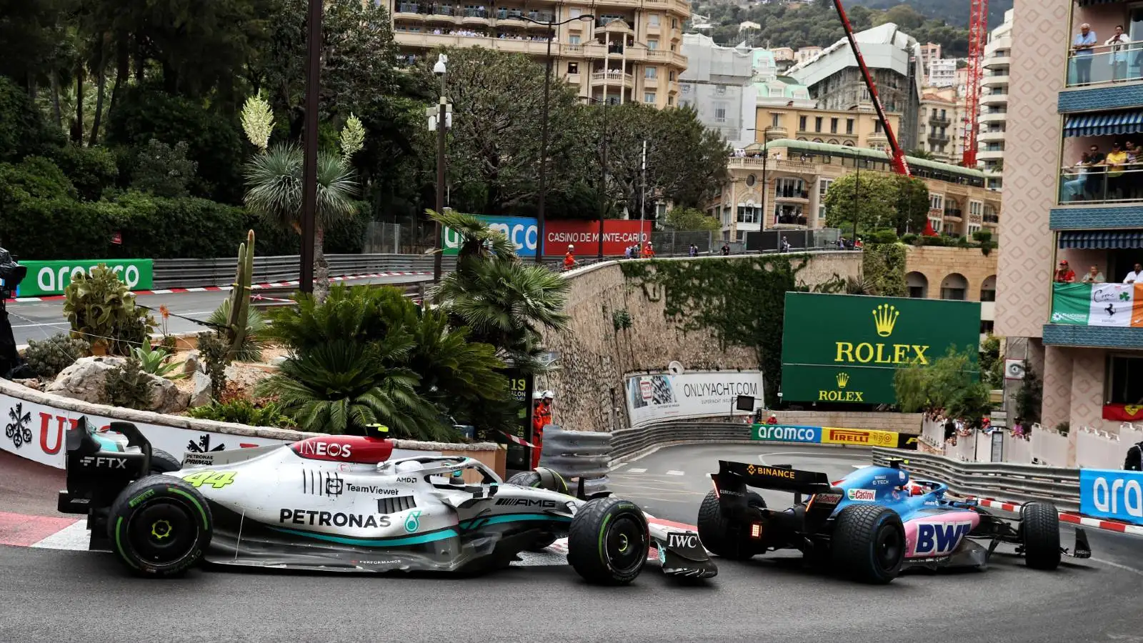 Lewis Hamilton's Mercedes chases Fernando Alonso's Alpine. Monaco May 2022.