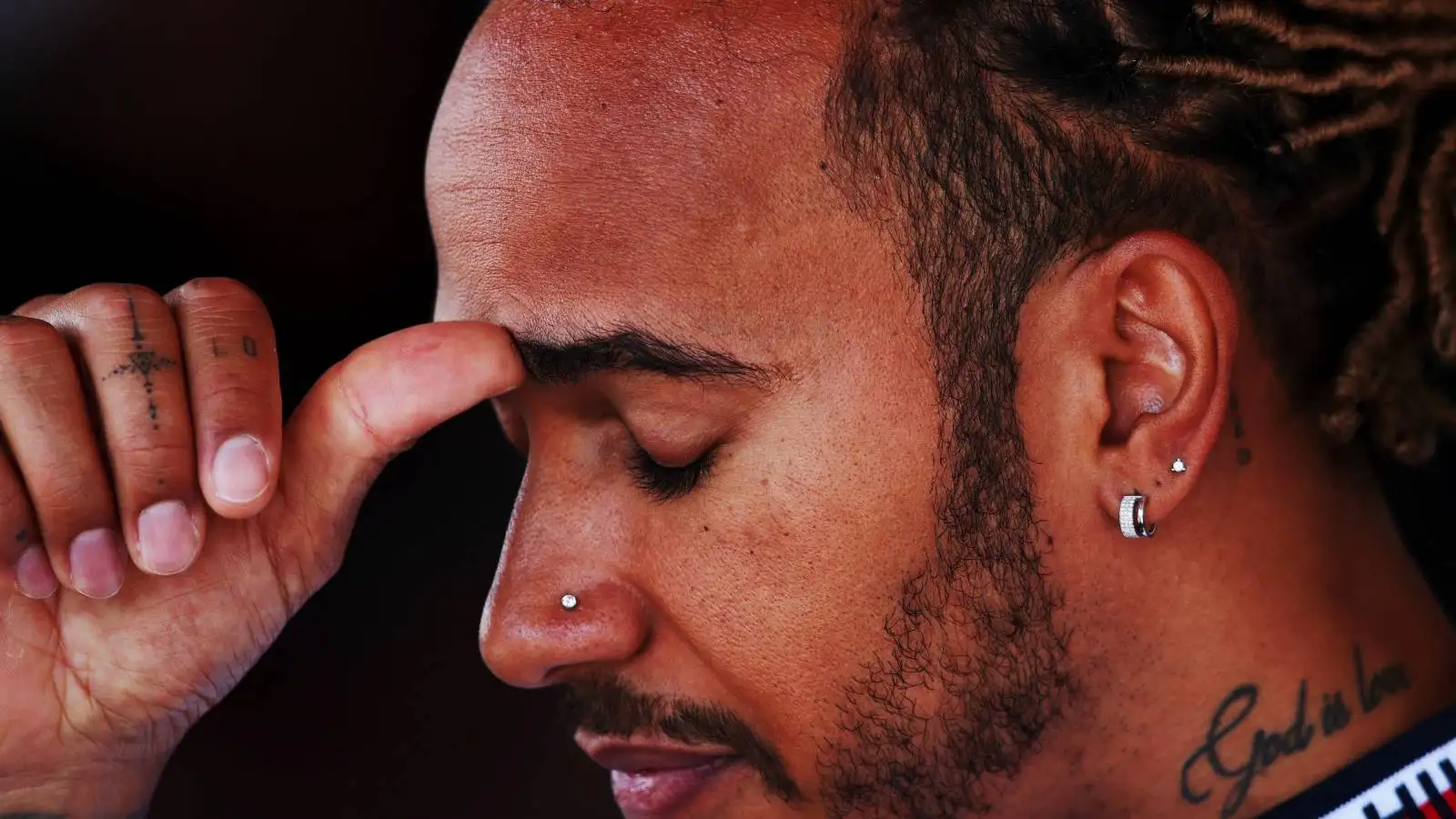 Lewis Hamilton, Mercedes, looks disappointed. Azerbaijan, June 2022.