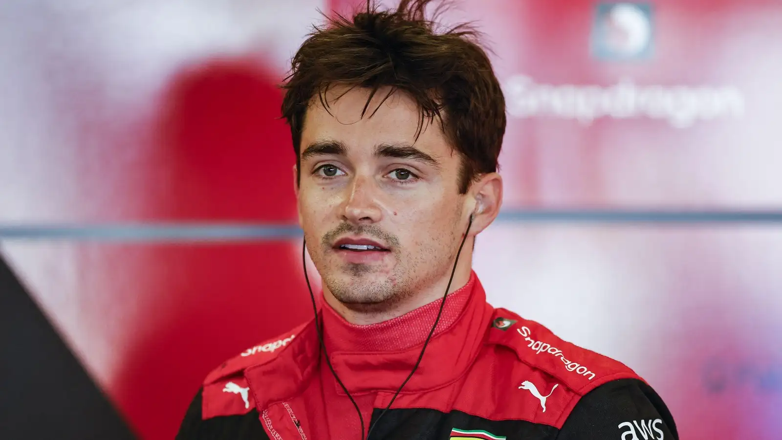 Charles Leclerc stands in the Ferrari garage. Azerbaijan, June 2022.