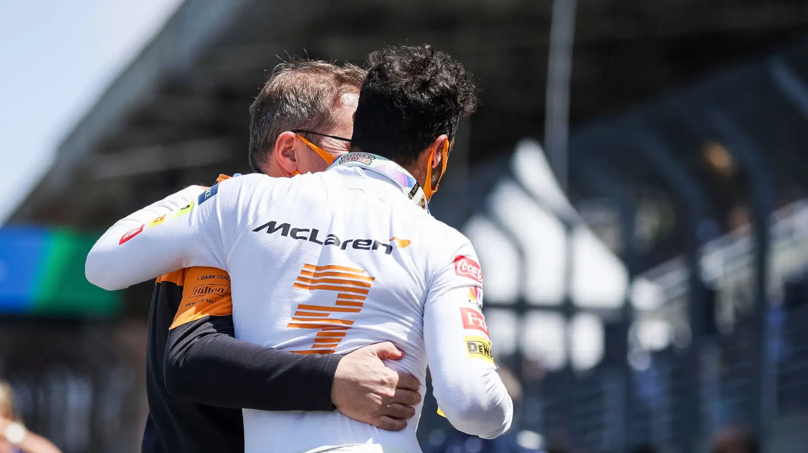 McLaren team boss Andreas Seidl hugs Daniel Ricciardo. Brazil November 2021