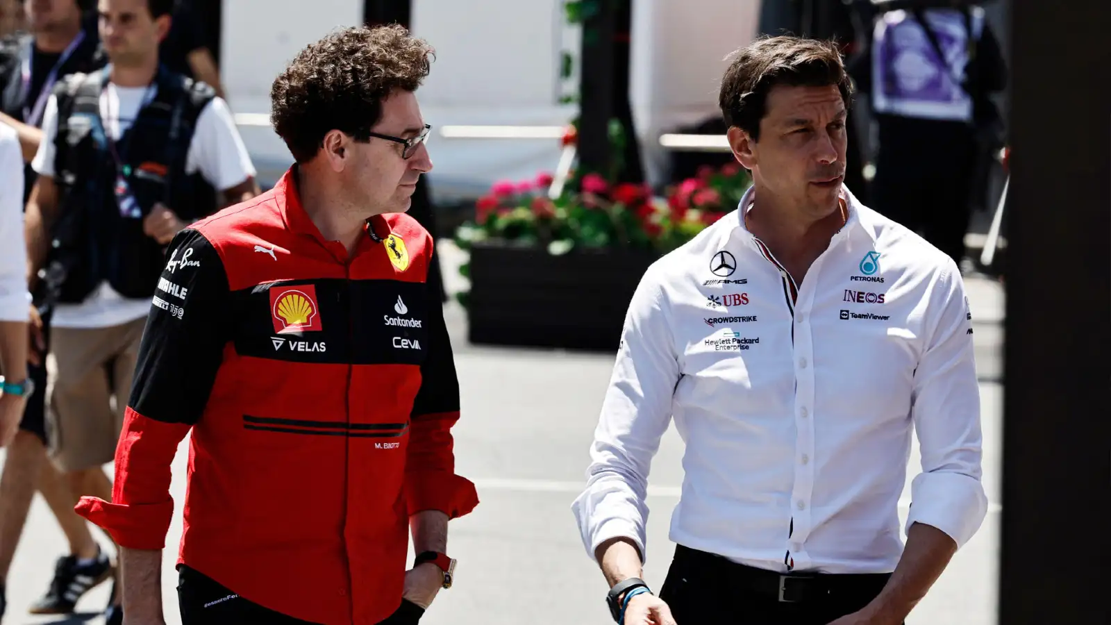 Ferrari's Mattia Binotto with Mercedes' Toto Wolff in the paddock at the Azerbaijan Grand Prix. Baku, June 2022.