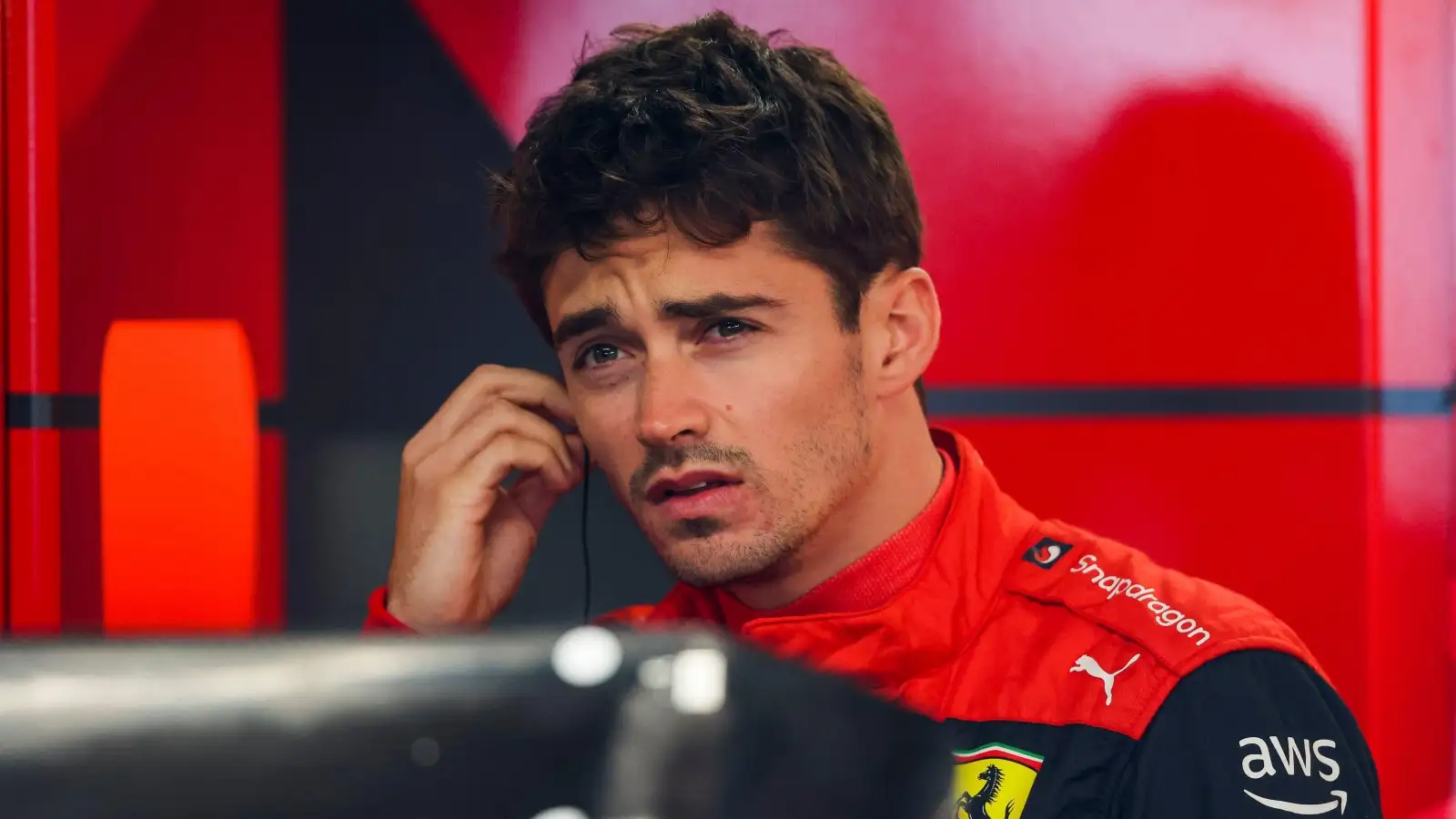 Charles Leclerc adjust his earpiece. Montreal, June 2022.