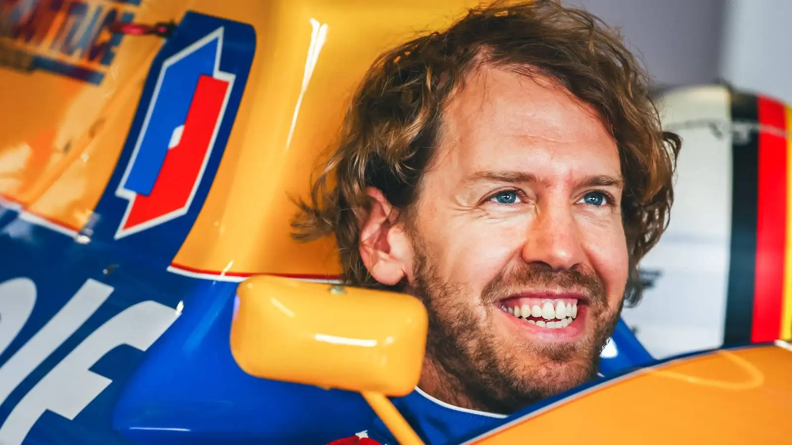 Sebastian Vettel sits in Nigel Mansell's Williams FW14B. England, June 2022.