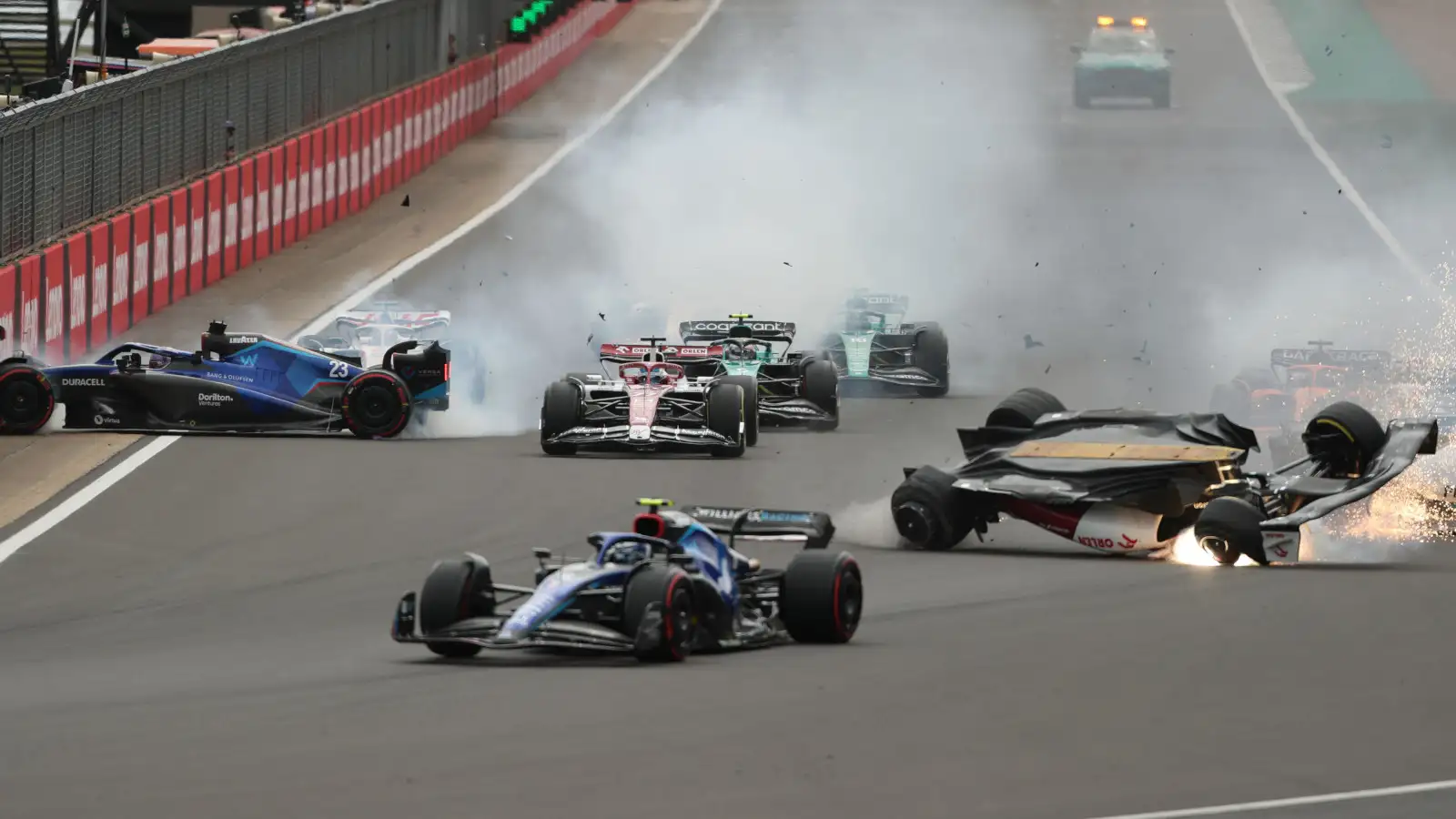 Alex Albon and Zhou Guanyu crashes on the opening lap. Silverstone July 2022