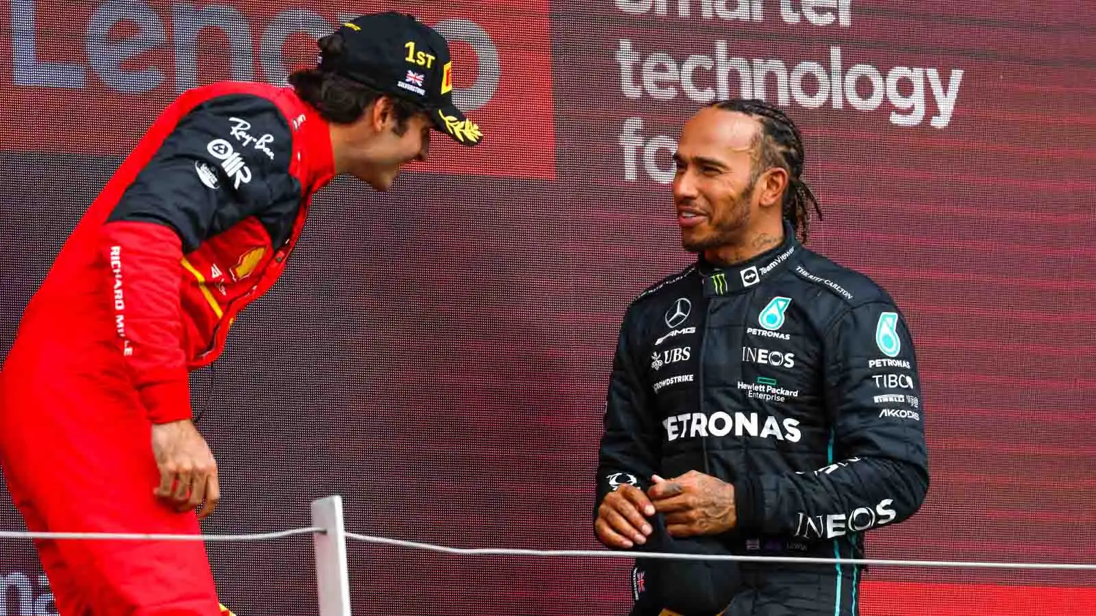 Carlos Sainz and Lewis Hamilton speak. Silverstone July 2022.