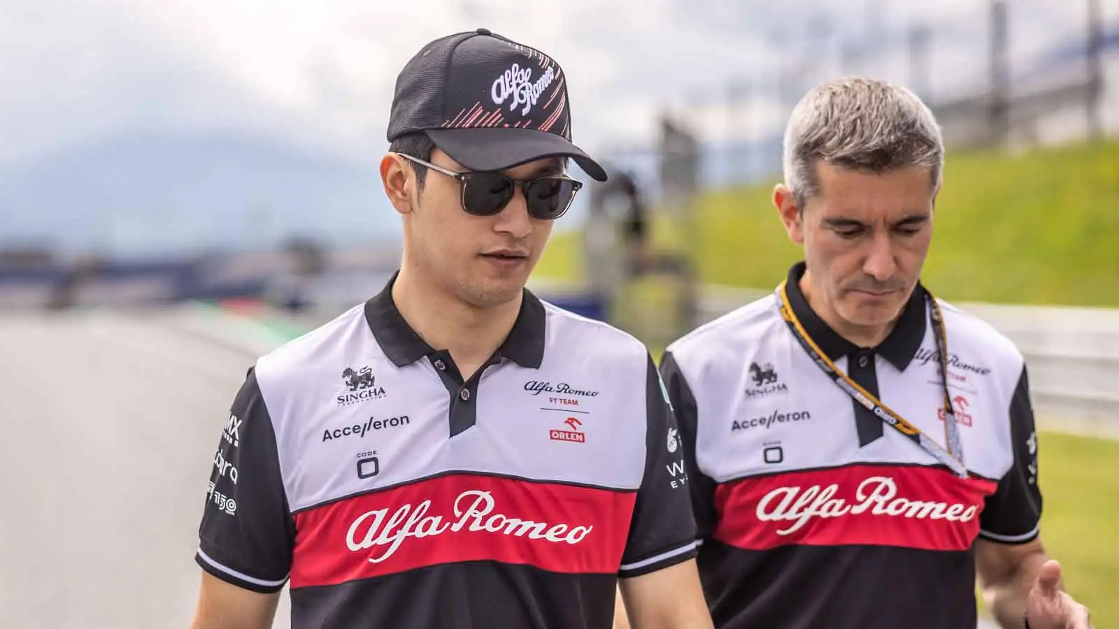 Zhou Guanyu walks the track. Austria July 2022.