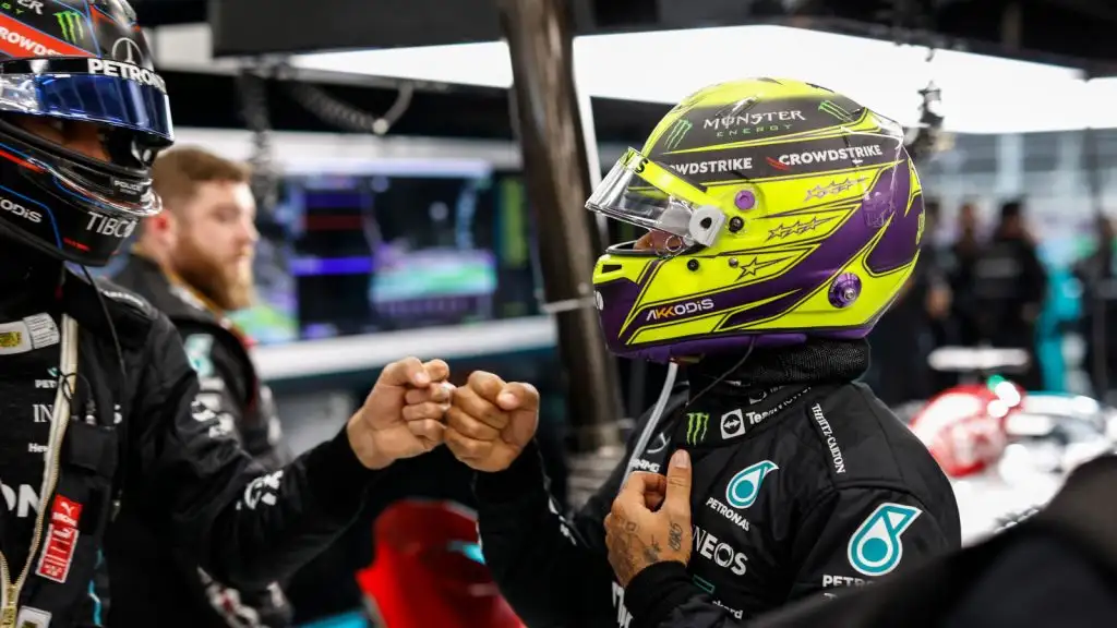 Fist bump between George Russell and Lewis Hamilton. Jeddah March 2022