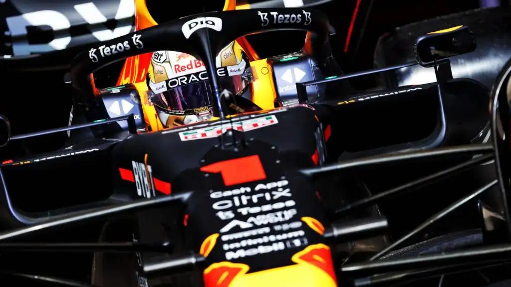 Max Verstappen up close, steering wheel angled. Spain May 2022
