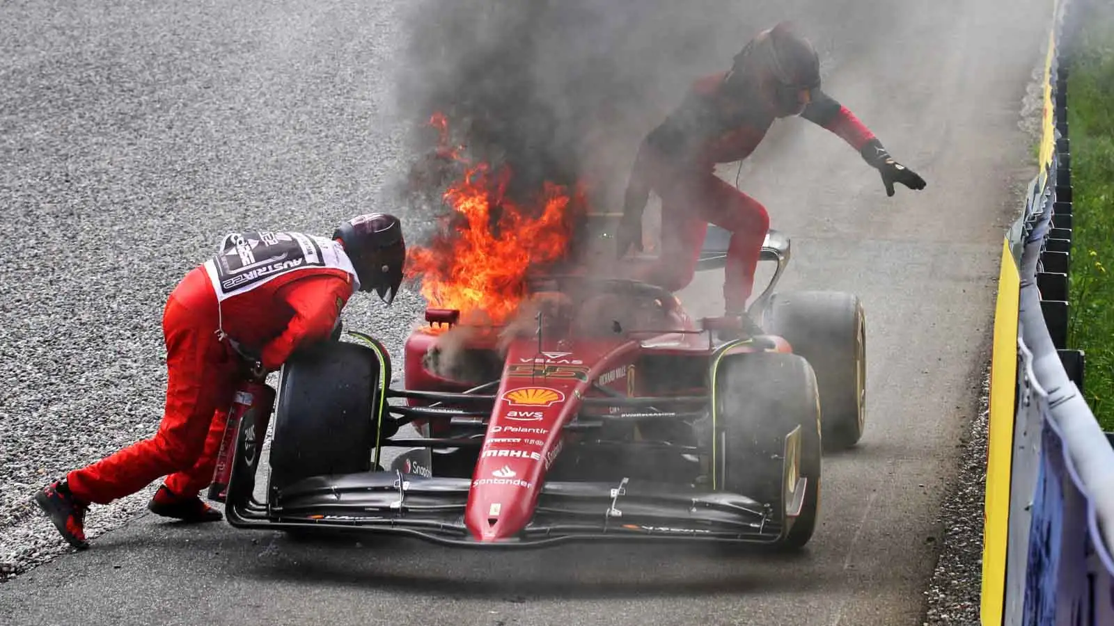 Carlos Sainz escapes his car. Austria July 2022.