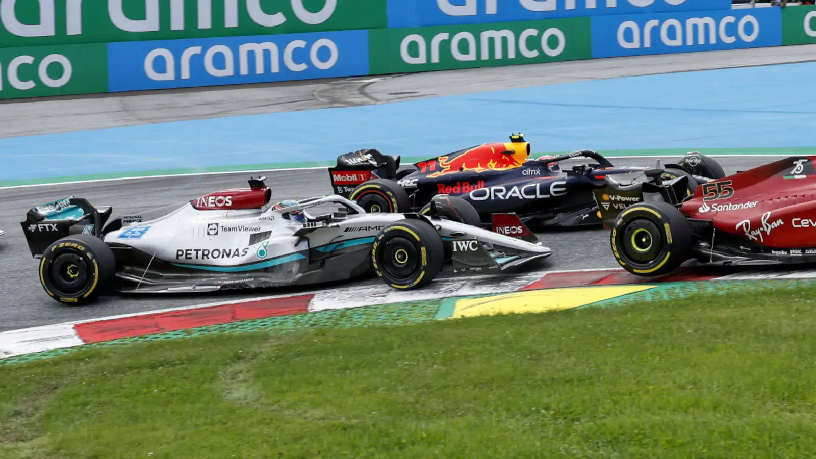 George Russell racing Sergio Perez on the opening lap. Austria July 2022