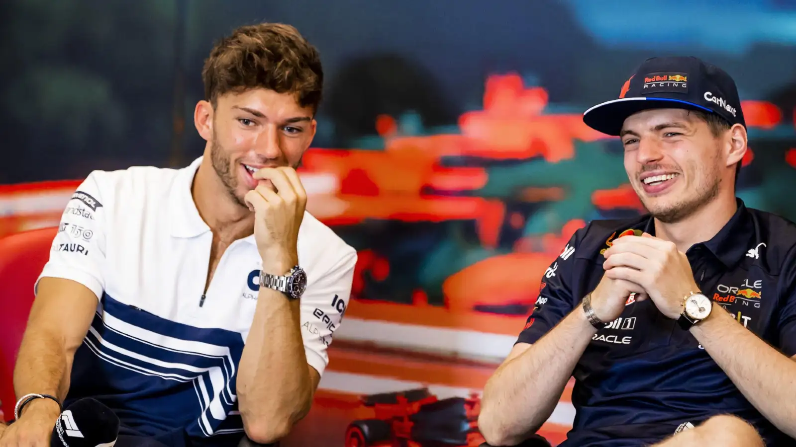 AlphaTauri's Pierre Gasly and Red Bull's Max Verstappen laugh together at the 2022 Monaco Grand Prix. Monte Carlo, May 2022. F1 penalty points