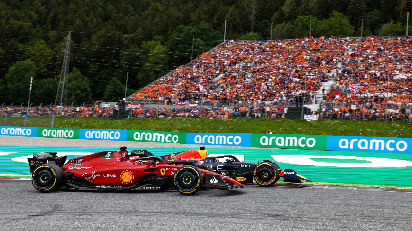 Ferrari's Charles Leclerc and Red Bull's Max Verstappen battle at the Austrian Grand Prix. Spielberg, July 2022.