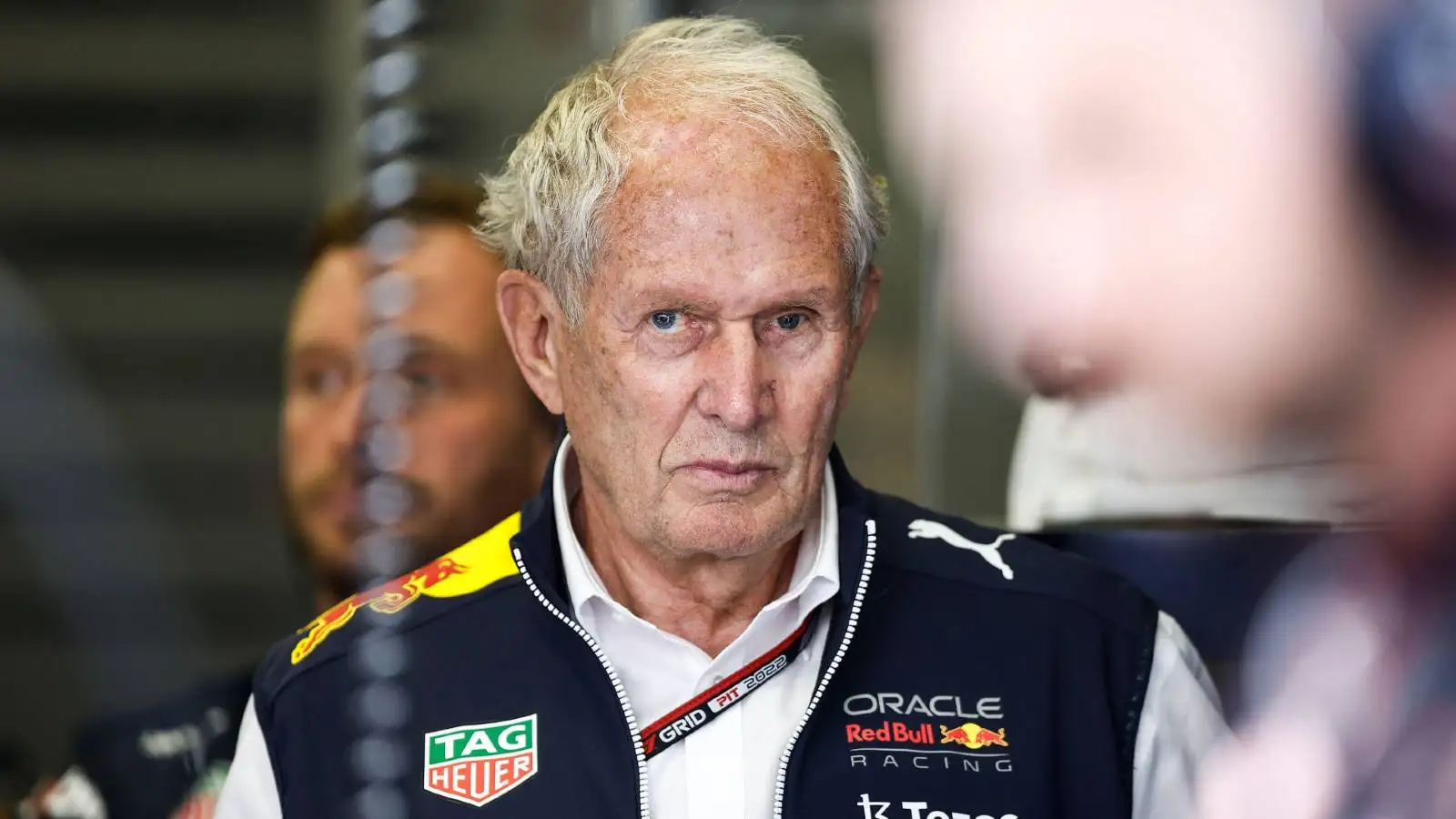 Red Bull motorsport advisor Helmut Marko looking straight ahead in the Red Bull garage at the 2022 Austrian GP.