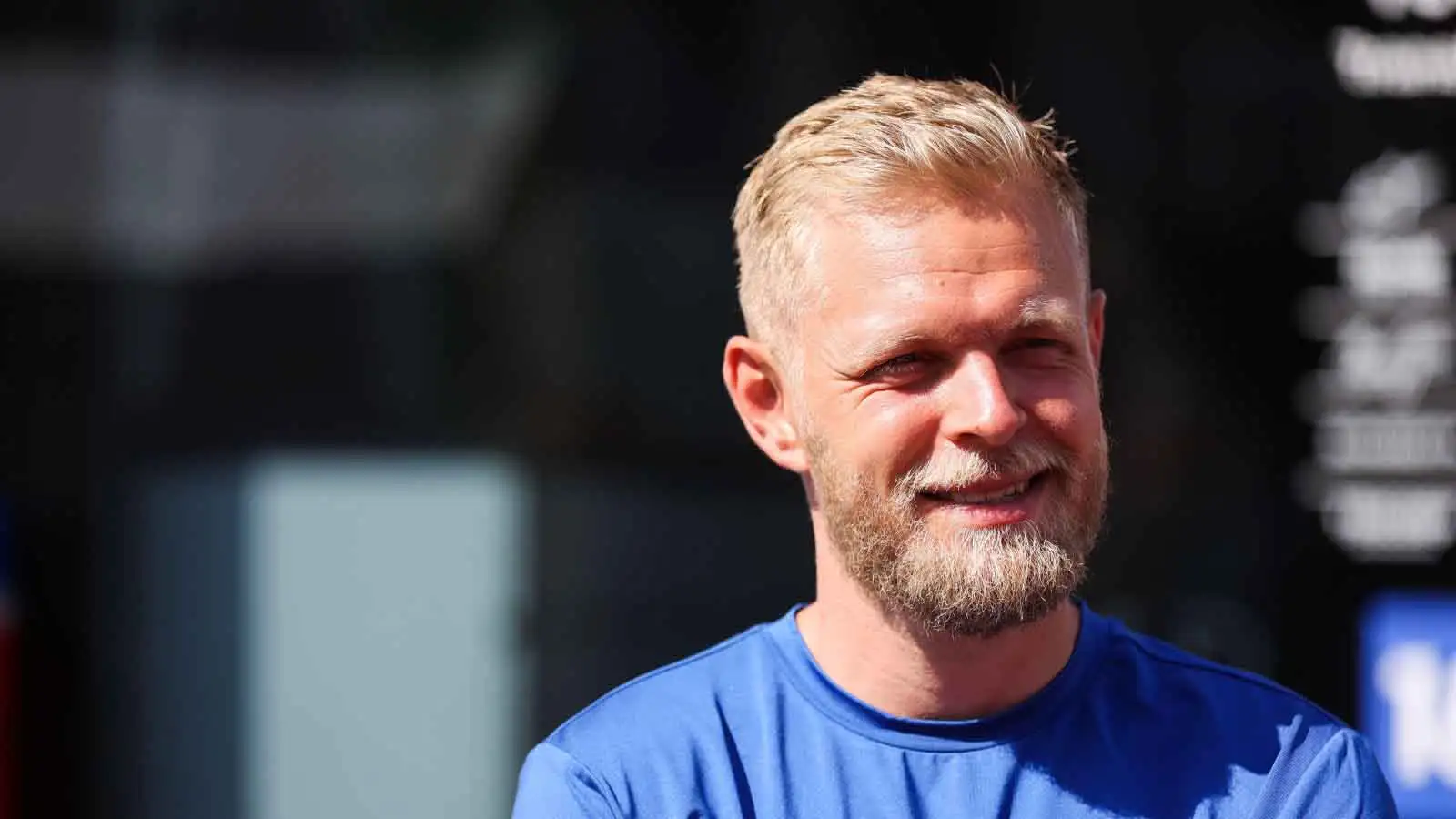 Haas driver Kevin Magnussen smiles. France July 2022.