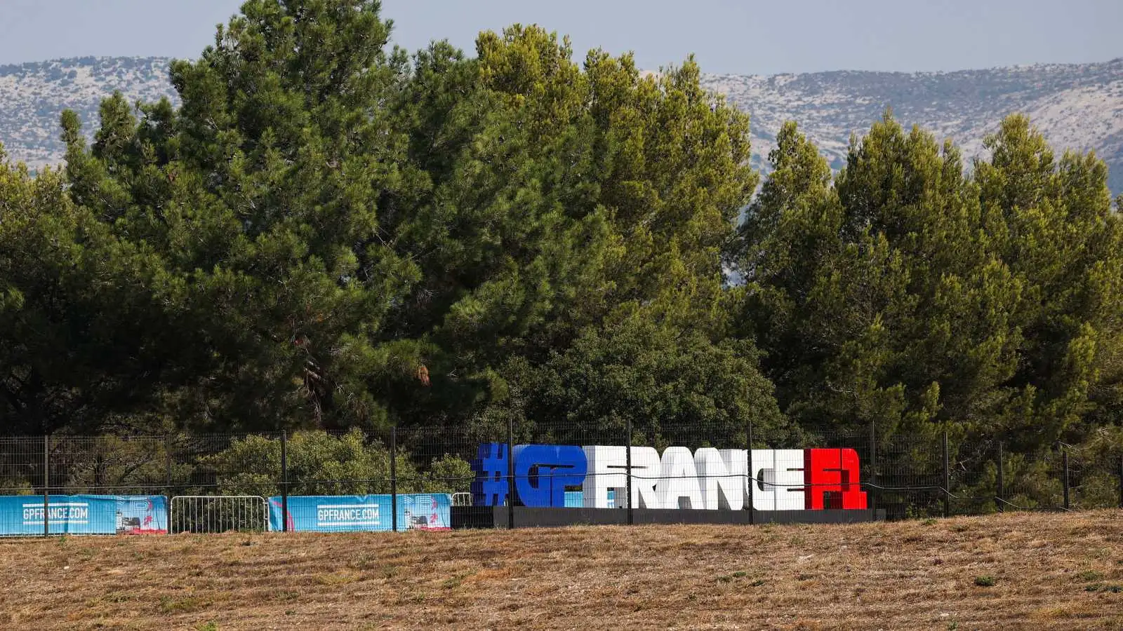 A social media hashtag sign at Paul Ricard. France, July 2022.