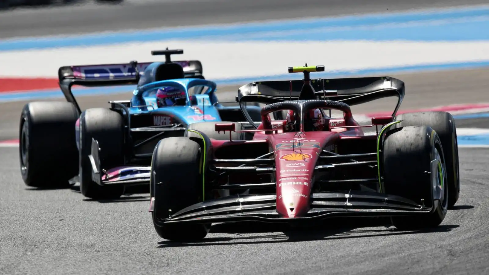 Carlos Sainz's Ferrari ahead of an Alpine. Paul Ricard July 2022.