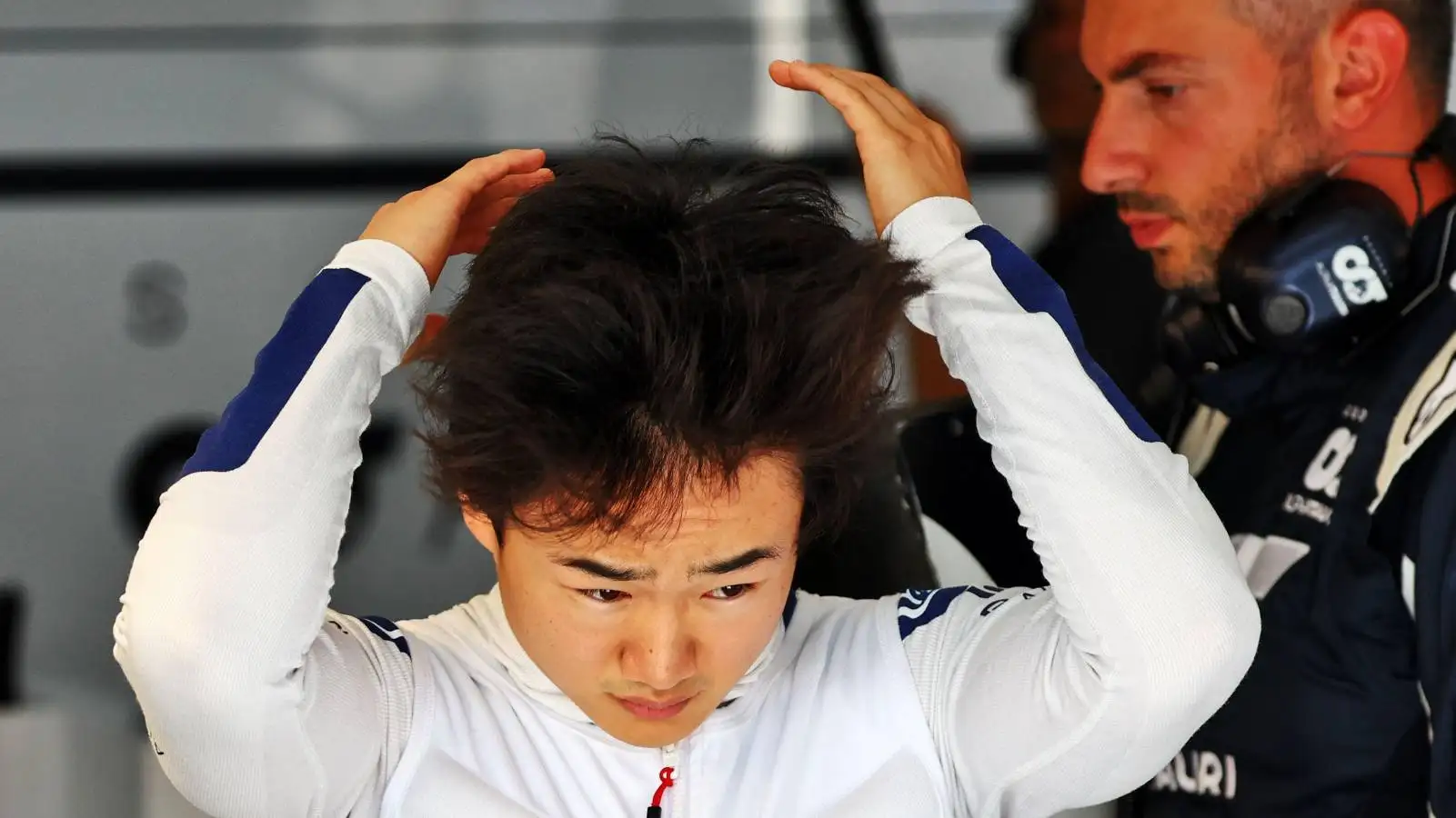 Yuki Tsunoda ruffling his hair. Paul Ricard July 2022.