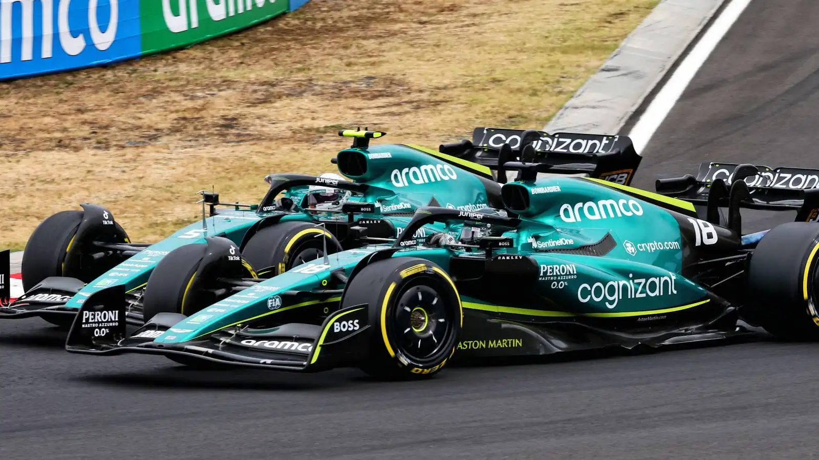 Sebastian Vettel and Lance Stroll, Aston Martin, side-by-side. Hungary, July 2022.