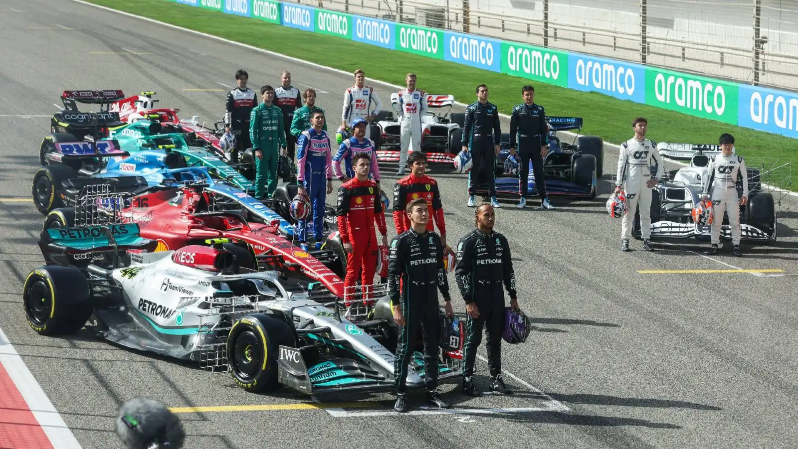 F1 2022 drivers line up next to their cars. Bahrain March 2022.