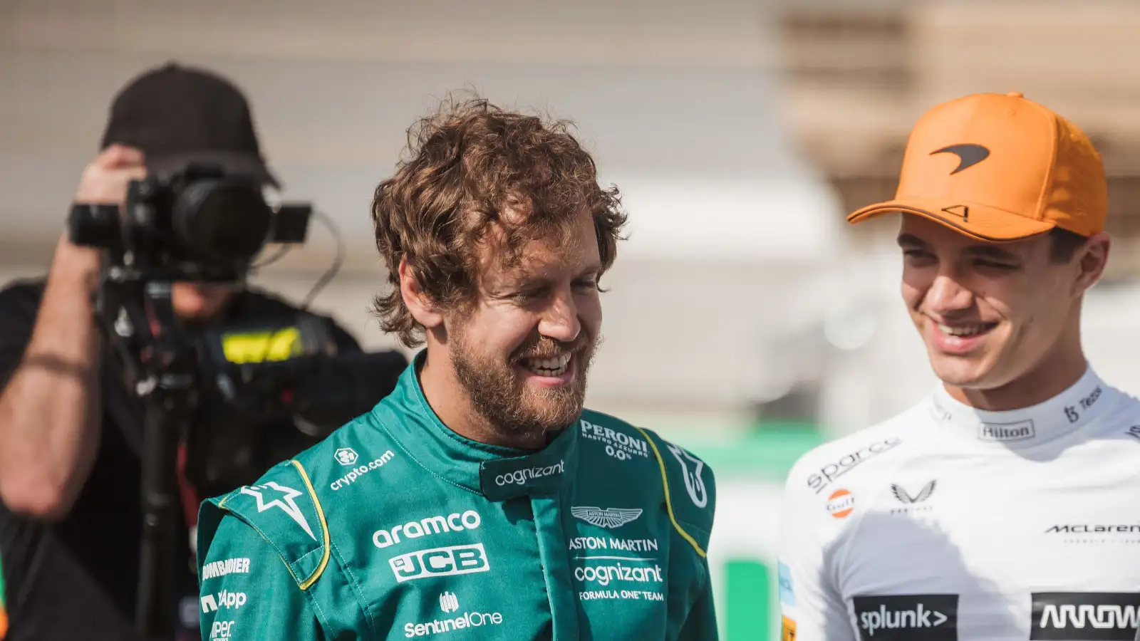 Sebastian Vettel laughing with Lando Norris. Bahrain March 2022