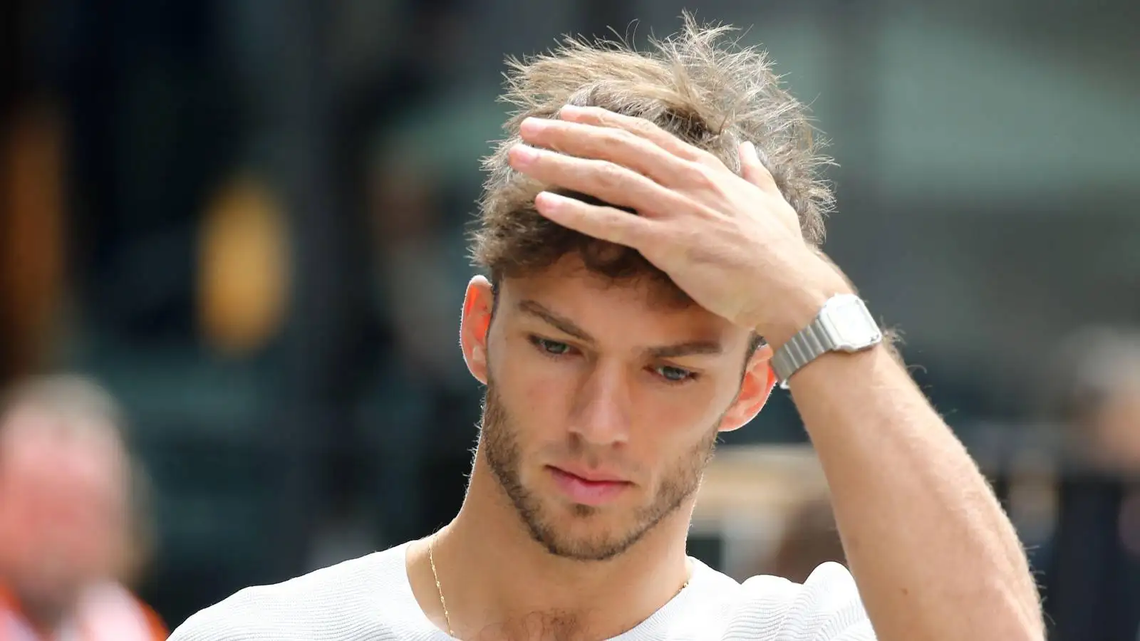 Pierre Gasly with his hand on his head. Hungaroring July 2022.