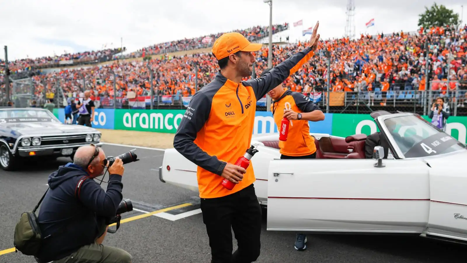 Daniel Ricciardo waves to the crowd. Hungaroring July 2022.