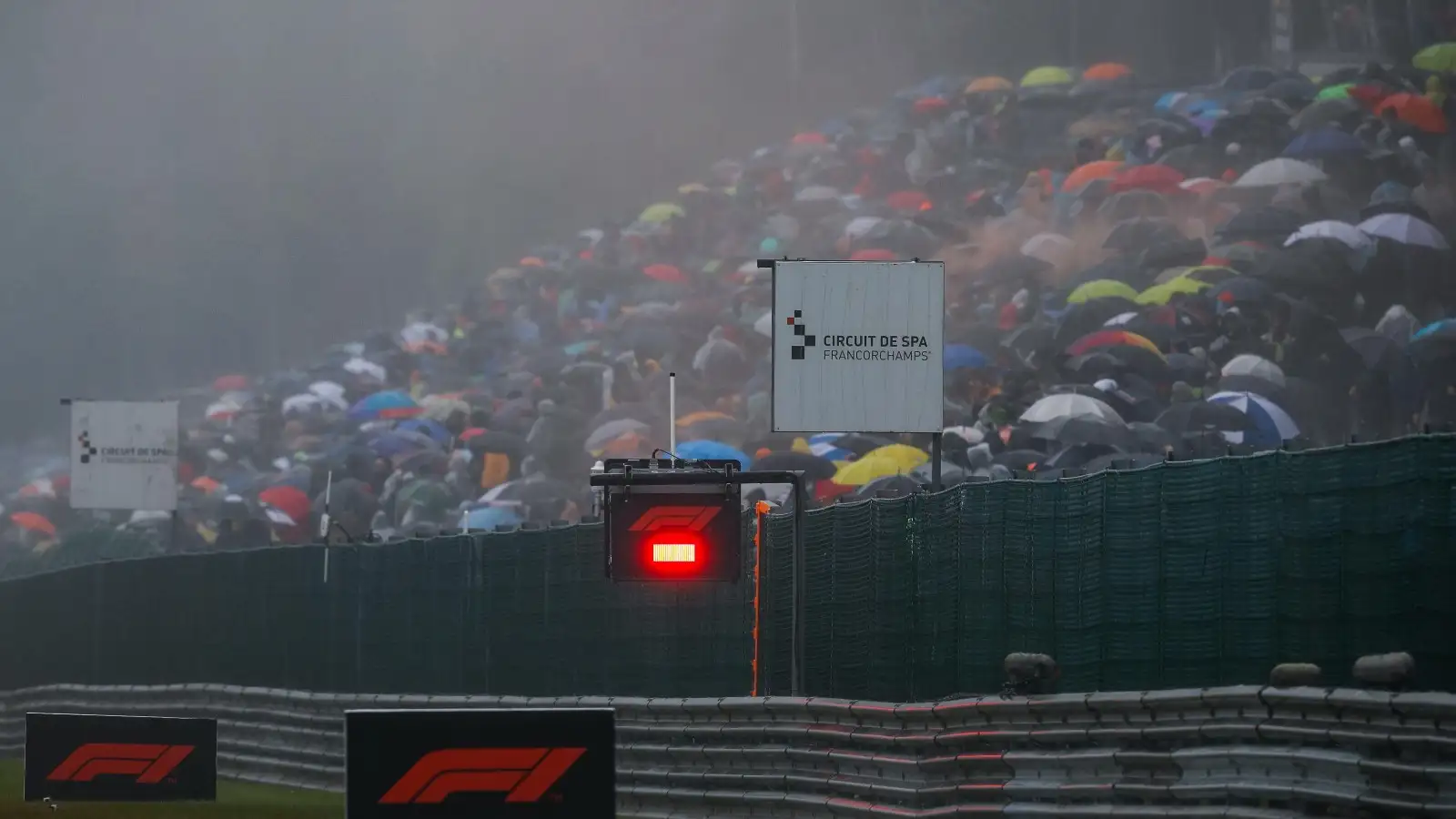 Fans under umbrellas at the Belgian Grand Prix. August 2021.