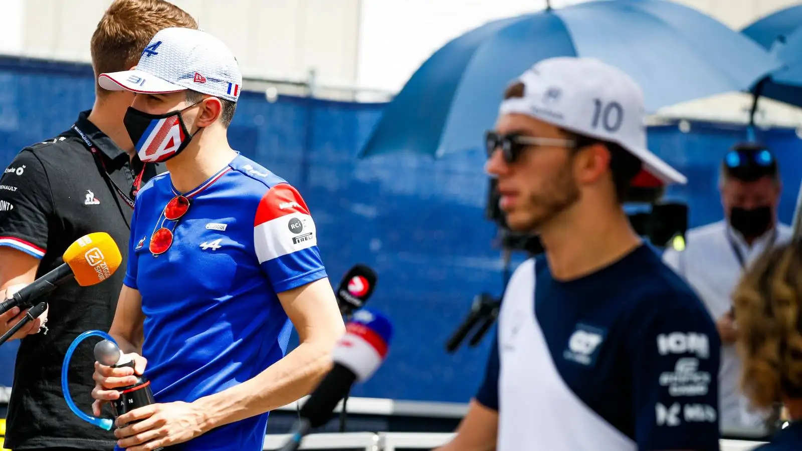 Esteban Ocon, Alpine, and Pierre Gasly, AlphaTauri, talk to media. Austria, June 2021.