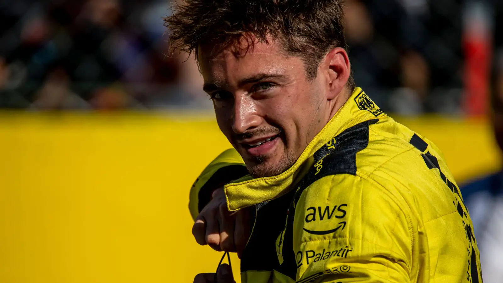 Charles Leclerc grinning after taking pole position. Italy September 2022