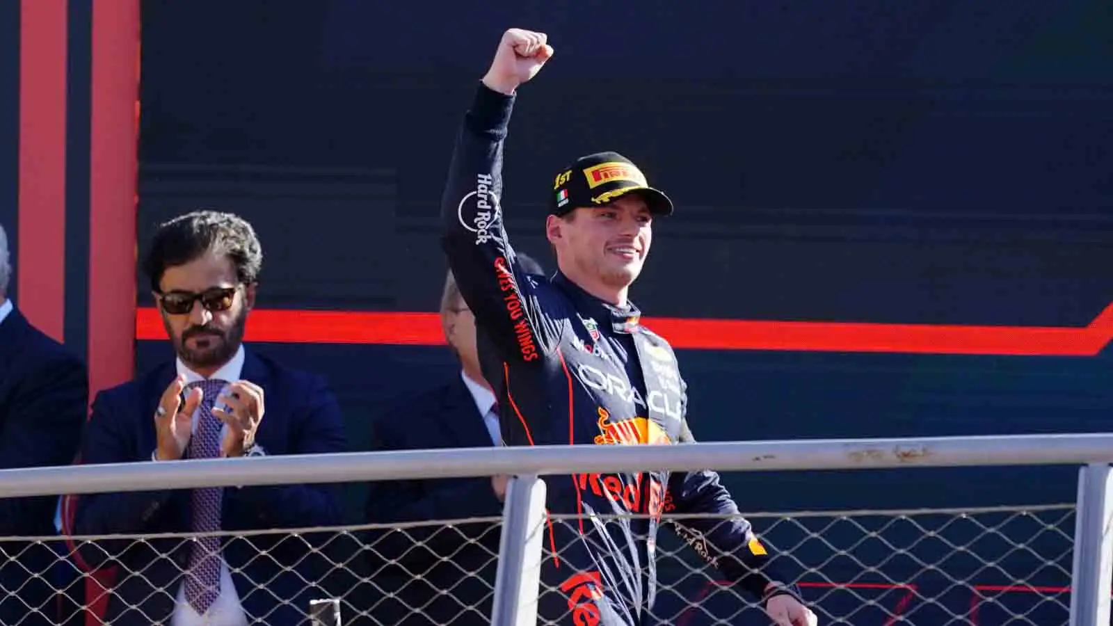 Max Verstappen walks onto the podium. Monza September 2022.