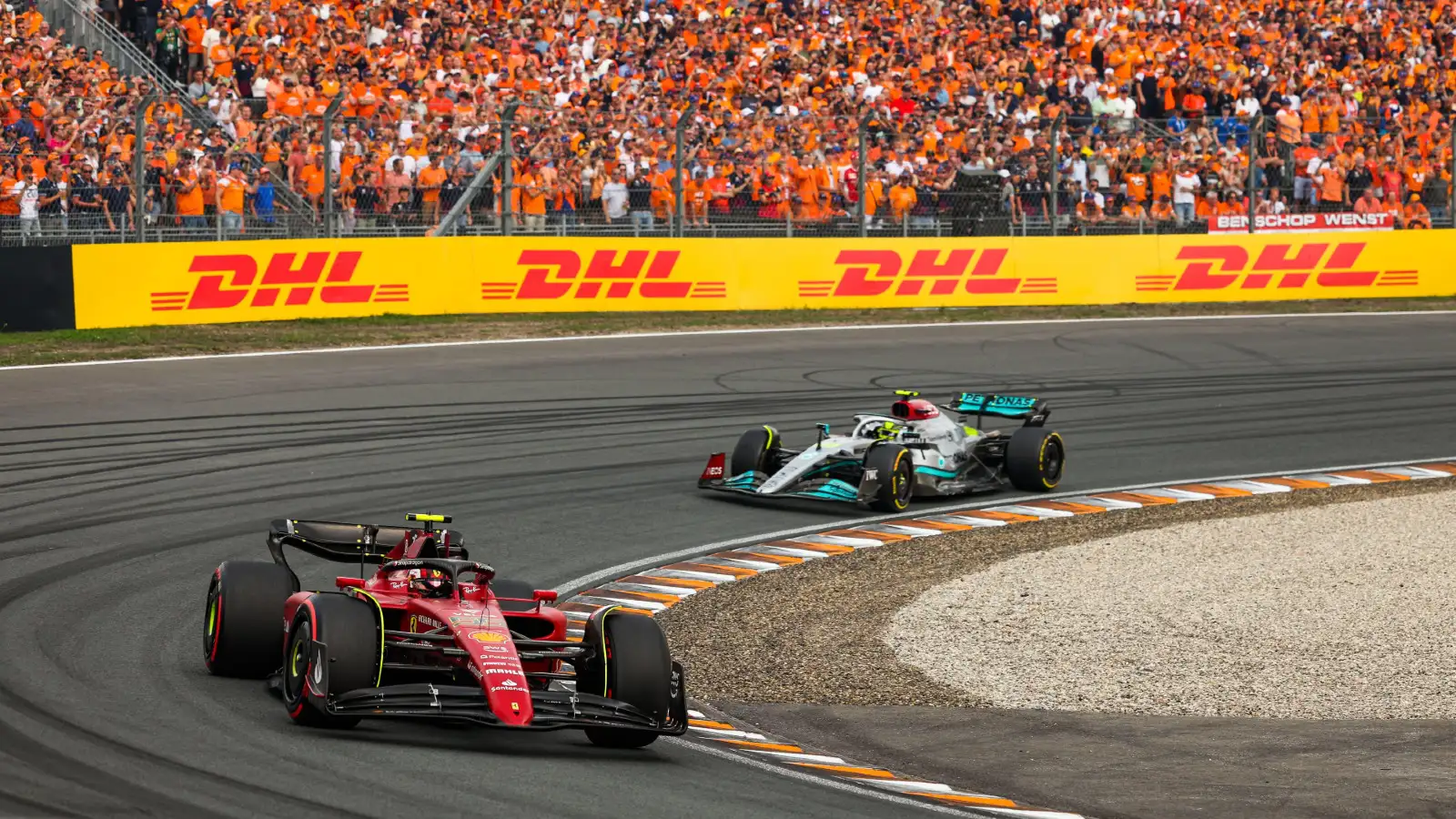 Ferrari driver Carlos Sainz races Mercedes driver Lewis Hamilton at the Dutch Grand Prix. Zandvoort, September 2022.