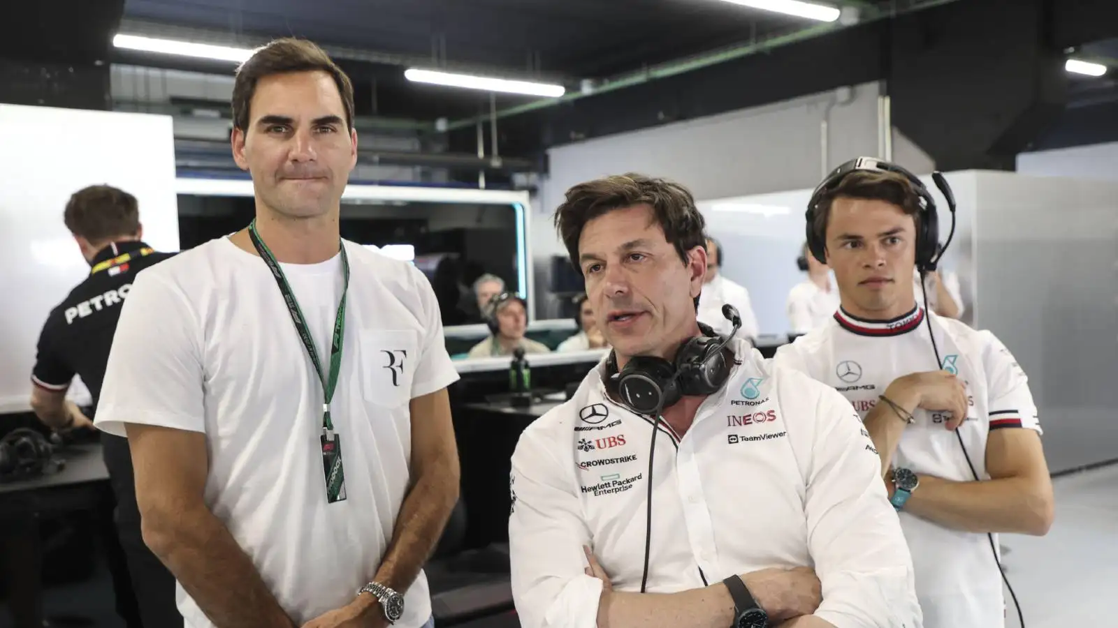 Roger Federer standing next to Toto Wolff and Nyck de Vries. Barcelona May 2022.