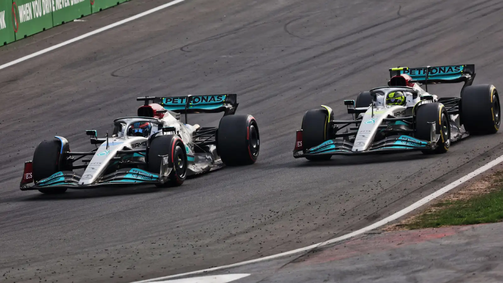 Mercedes' George Russell passes Lewis Hamilton during the Dutch Grand Prix. Zandvoort, September 2022.