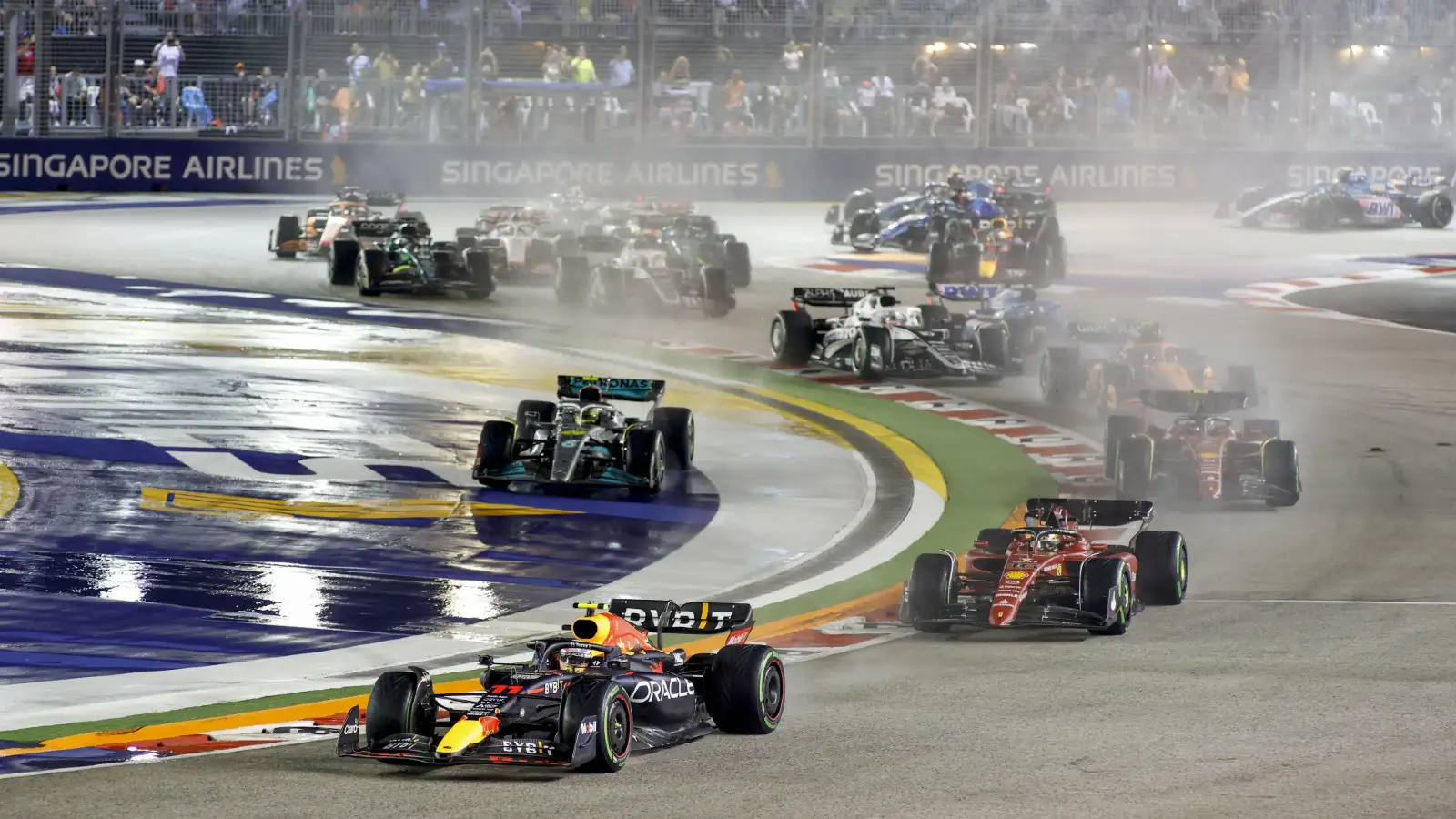 Red Bull Sergio Perez leads the pack at the Singapore Grand Prix. Marina Bay, October 2022. Budget cap