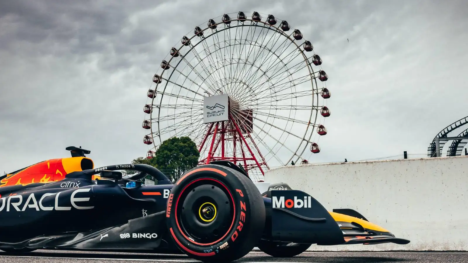 Max Verstappen passes big wheel at Japanese Grand Prix.