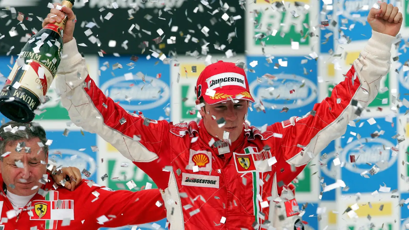 Ferrari's Kimi Raikkonen celebrates the win and his world championship title at the 2007 Brazilian Grand Prix. Interlagos, October 2007.