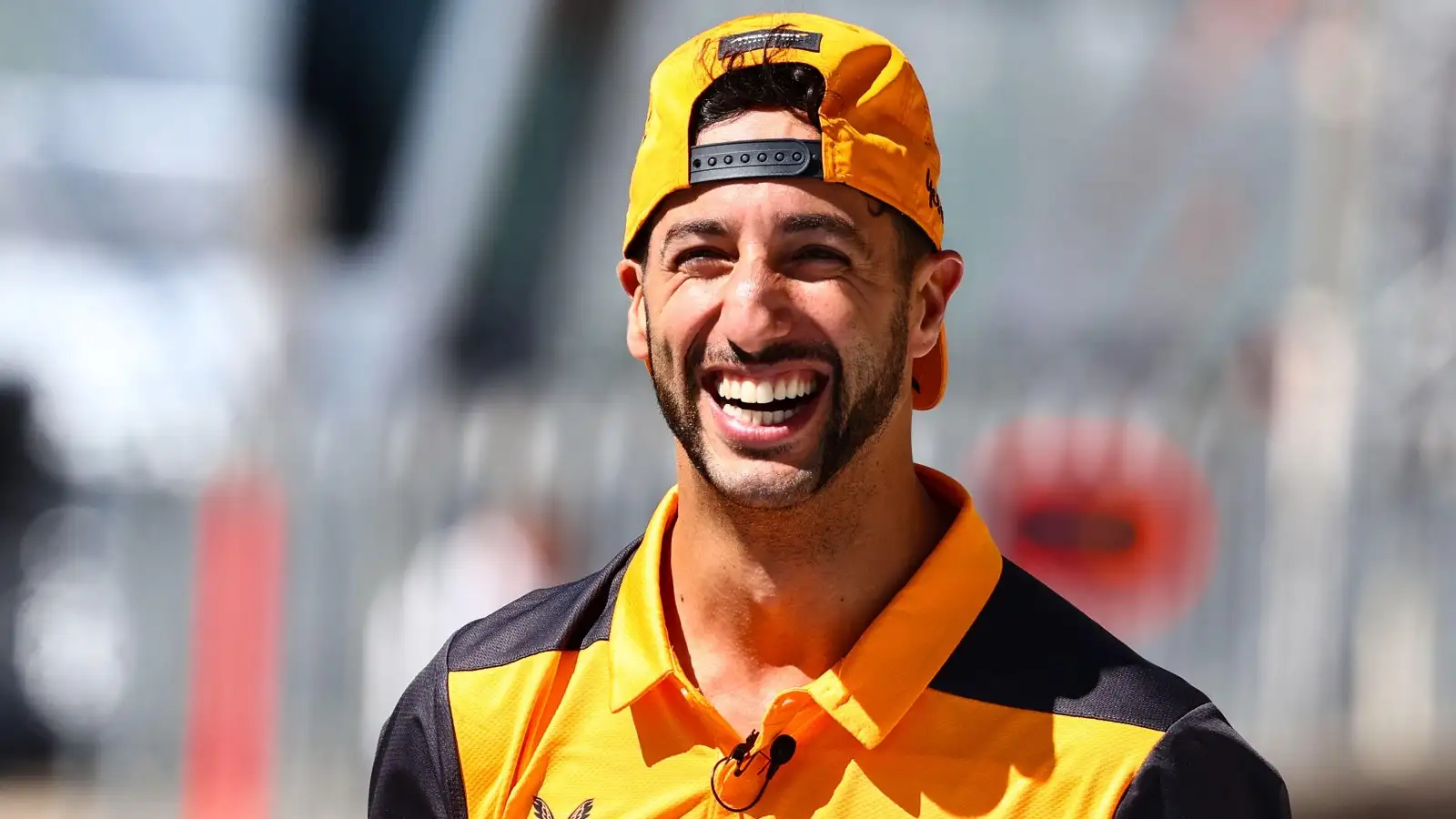 Daniel Ricciardo smiling with his hat backwards. Austin, October 2022.