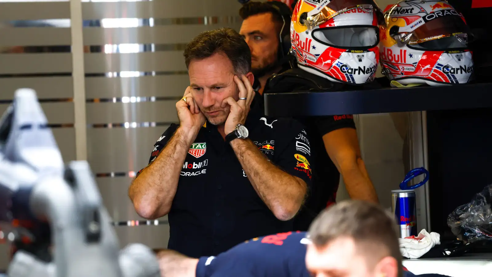 Christian Horner in the garage with his ears covered. Austin October 2022
