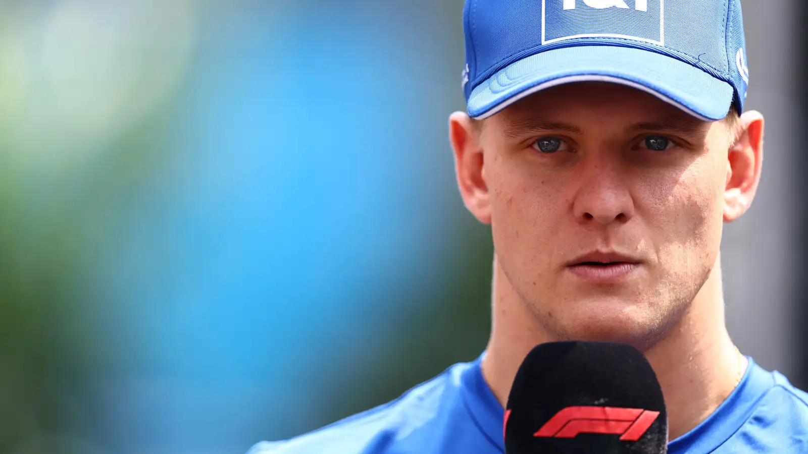 Mick Schumacher serious standing in front of the F1 mic. Mexico October 2022
