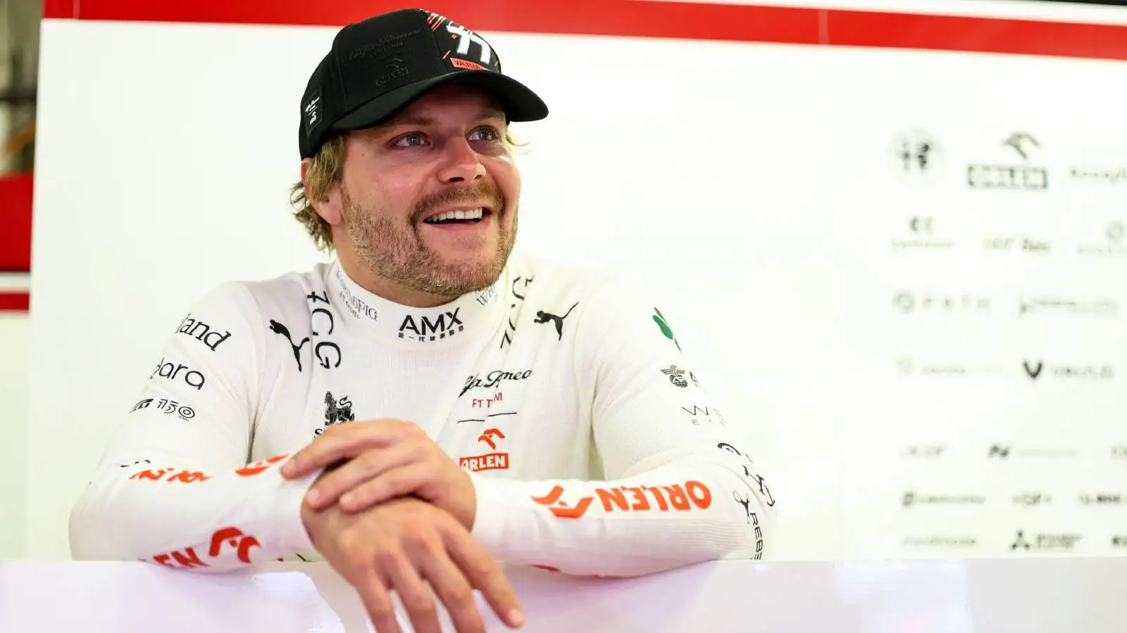 Valtteri Bottas smiling in Alfa Romeo garage. Mexico City October 2022.