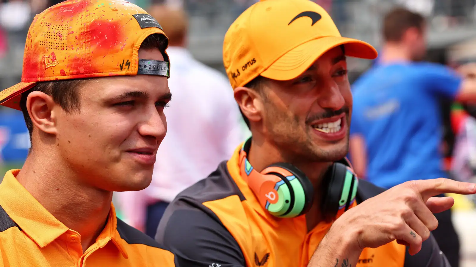 Lando Norris and Daniel Ricciardo laughing on the driver parade. Mexico October 2022