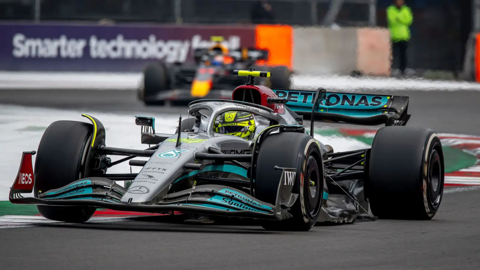 Mercedes driver Lewis Hamilton is chased by a Red Bull. Mexico October 2022