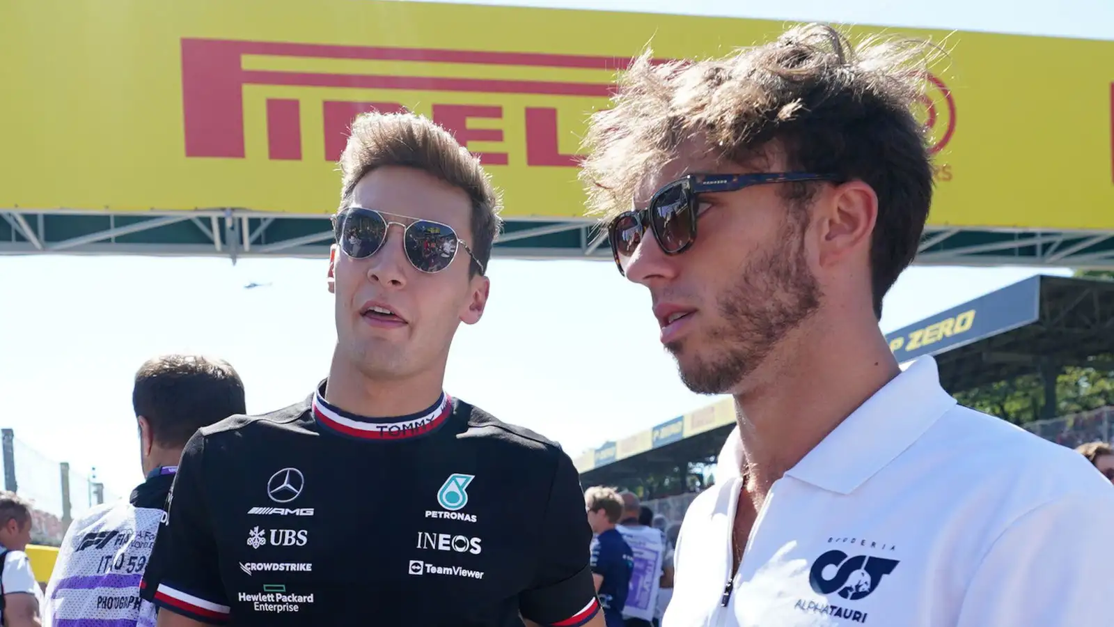 Mercedes' George Russell speaking with Pierre Gasly. Monza September 2022.