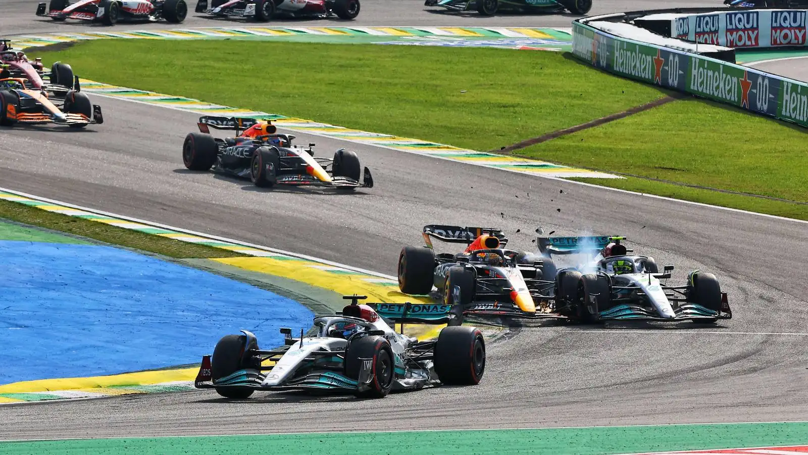 Max Verstappen and Lewis Hamilton collide. Brazil, November 2022.